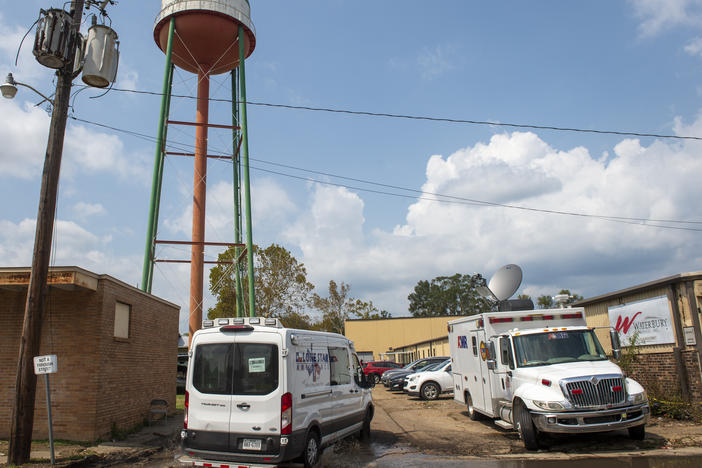 Emergency personnel arrive to evacuate people at a mass shelter, on Sept. 2, 2021 in Independence, La. The owner of seven Louisiana nursing homes whose residents suffered in squalid conditions after being evacuated to a warehouse for Hurricane Ida has been arrested.