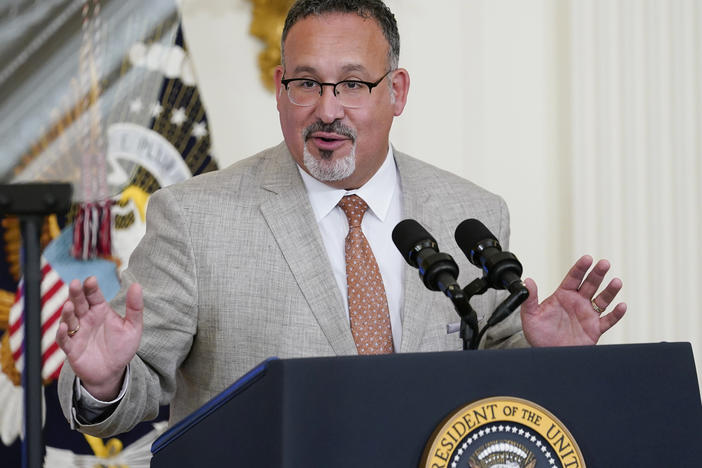 Education Secretary Miguel Cardona speaks at the White House on April 27. The Biden administration proposed a dramatic rewrite of campus sexual assault rules on Thursday, moving to expand protections for LGBTQ students, bolster the rights of victims and widen colleges' responsibilities in addressing sexual misconduct.