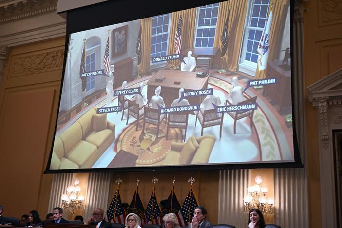 An illlustration of a meeting at the Oval Office of the White House appears onscreen during a hearing by the House select committee to investigate the Jan. 6 Capitol attack in Washington on Thursday.