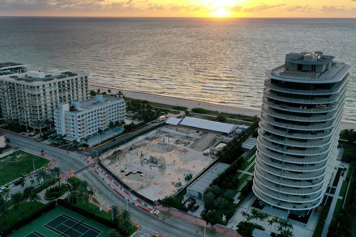 In an aerial view, a cleared lot where the 12-story Champlain Towers South condo building once stood is seen on June 22, 2022 in Surfside, Florida. This week marks the first anniversary of the tragic event where 98 people died when the building partially collapsed.