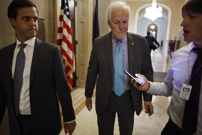 Senate Minority Whip John Cornyn of Texas, the lead Republican negotiator, talks to reporters after giving a speech in support of the Bipartisan Safer Communities Act at the Capitol on Wednesday.