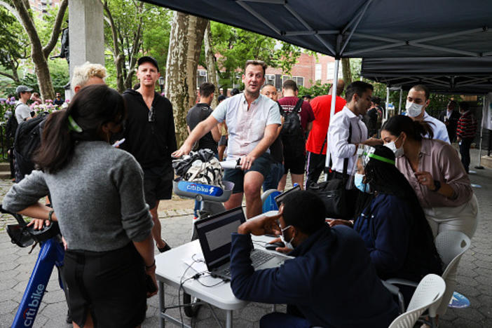 People line up outside of the New York City Department of Health and Mental Hygiene on June 23, as the city makes vaccines available to residents possibly exposed to monkeypox.