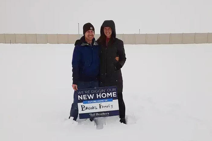 Ari and TR Brooks stood on the land where their new home would be built the day they agreed to buy it back in February of 2021. But the home is still not completed and mortgage rates have risen dramatically.