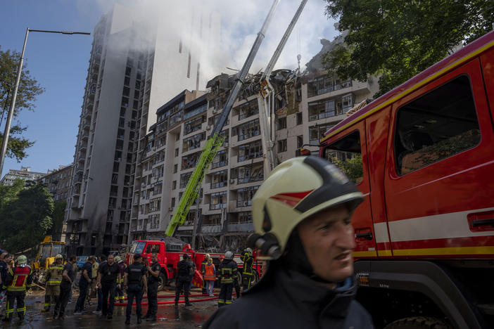 Firefighters work to rescue residents and put out a fire after a Russian missile hit an apartment building in Ukraine's capital Kyiv on Sunday morning. As President Biden and other leaders of the Group of 7 nations meet in Germany, Russia has unleashed a barrage of airstrikes across Ukraine over the weekend.