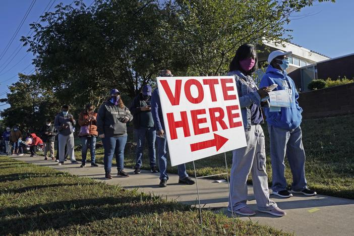 Voters line up to cast their ballots in the 2020 presidential election in Durham, N.C. The U.S. Supreme Court has agreed to hear a North Carolina redistricting case this fall about how much power state legislatures have over how federal elections are run.