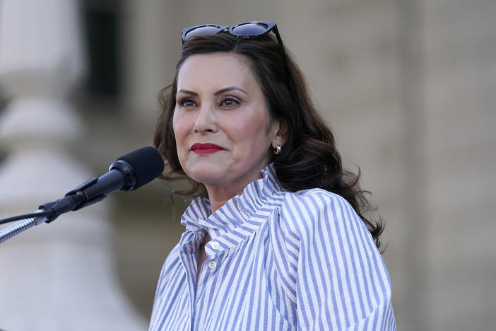 Gov. Gretchen Whitmer, a Democrat who is up for reelection this fall, speaks to abortion-rights protesters at a rally following the U.S Supreme Court's decision to overturn <em>Roe v. Wade</em> outside the state capitol in Lansing, Mich., Friday, June 24, 2022.