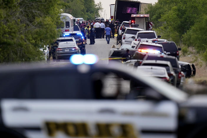 Police block the scene where a semitrailer with multiple dead bodies was discovered, Monday, June 27, 2022, in San Antonio.