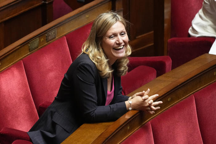 Yaël Braun-Pivet, a member of the centrist alliance Ensemble (Together) smiles at the National Assembly, Tuesday, June 28, 2022 in Paris.