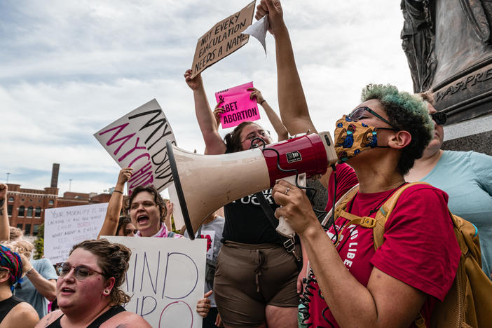 Abortion rights protesters in Louisville, Ky., after the Supreme Court announced it had voted to overturn <em>Roe v. Wade</em>. On Monday, abortion rights advocates filed a lawsuit arguing that the Kentucky state constitution protects the right to abortion.