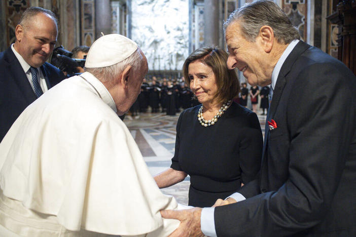 Pope Francis greets Speaker of the House Nancy Pelosi, D-Calif., and her husband, Paul, on Wednesday before celebrating a Mass on the Solemnity of Saints Peter and Paul in St. Peter's Basilica at the Vatican. Pelosi received Communion during the papal Mass, witnesses said, despite her position in support of abortion rights.