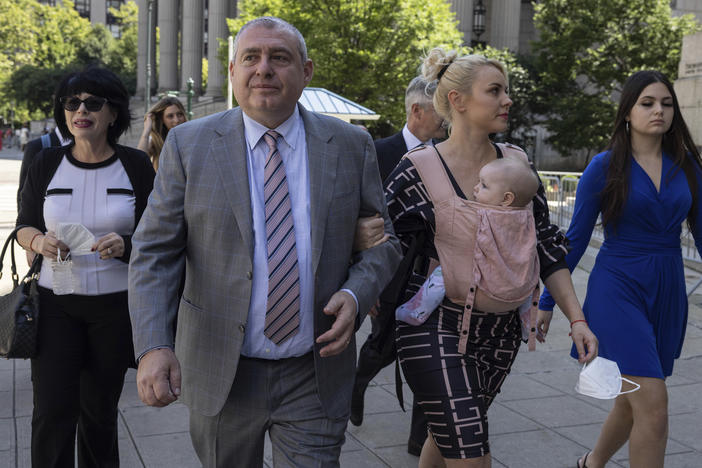 Lev Parnas, a former associate of Rudy Giuliani, arrives at the federal courthouse in New York with his wife Svetlana Parnas on Wednesday.