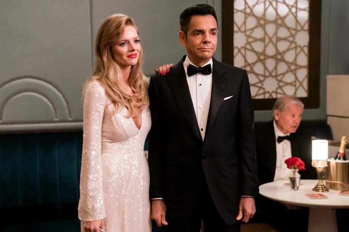 Samara Weaving as Olivia and Eugenio Derbez as Antonio in the new Hulu film <em>The Valet</em>.