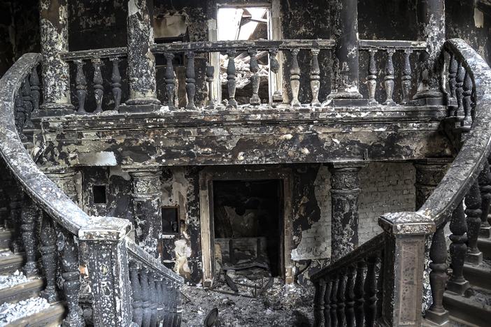 Debris covers the inside of the drama theater in April following a March 16 bombing in Mariupol, Ukraine, in an area now controlled by Russian forces.