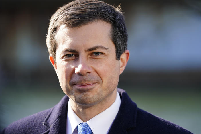 Transportation Secretary Pete Buttigieg listens at an event in Philadelphia, on Jan. 14, 2022.