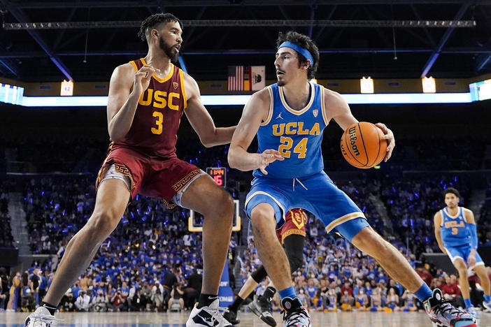 UCLA guard Jaime Jaquez Jr., right, tries to get by Southern California forward Isaiah Mobley during the second half of an NCAA college basketball game on March 5, 2022, in Los Angeles.