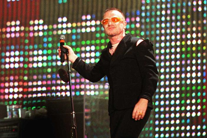 Bono on stage at the start of U2's "POPMART" tour.