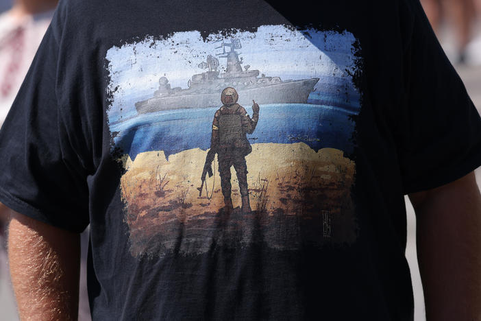 A T-shirt, worn at a Berlin rally this month to support European aid to Ukraine, celebrates the Ukrainian soldiers on Snake Island who refused to surrender to Russian naval forces.