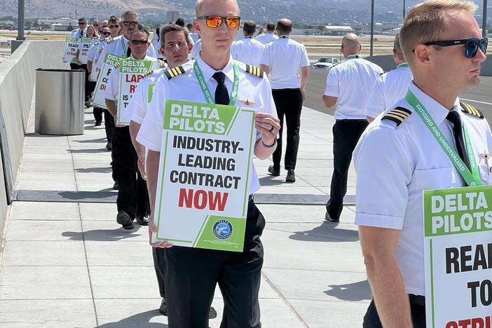Delta pilots engaged in demonstrations at seven airports around the U.S. on Thursday calling for higher pay, among other things. This photo was taken at Salt Lake City International Airport.