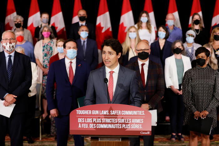 Canada's Prime Minister Justin Trudeau, with government officials and gun control advocates, speaks at a news conference on May 30 about firearm-control legislation that was tabled in the House of Commons in Ottawa, Ontario, Canada.