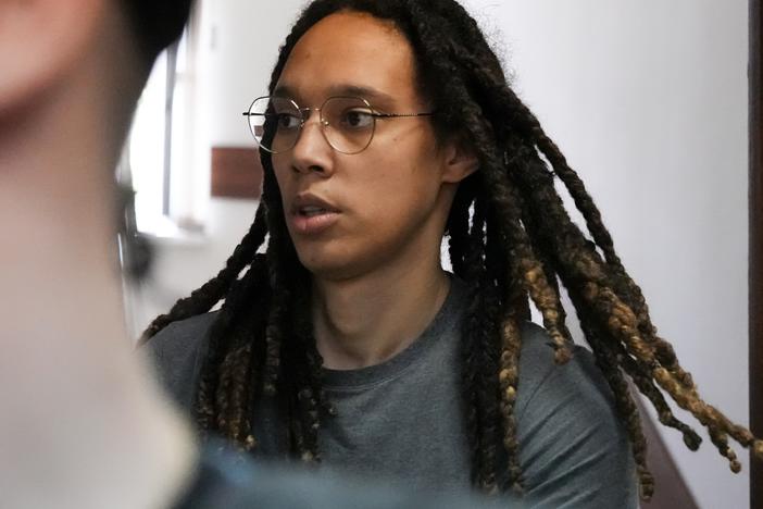 WNBA star and two-time Olympic gold medalist Brittney Griner is escorted to a courtroom for a hearing, in Khimki just outside Moscow, Russia, Monday, June 27, 2022.