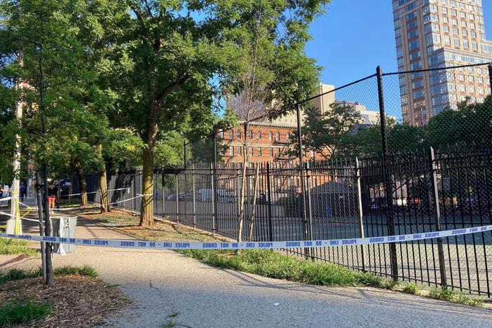 Crime scene tape surrounds the area on New York's Upper East Side, Thursday, June 30, 2022, where police say a 20-year-old woman was fatally shot Wednesday night while she pushed her infant in a stroller.