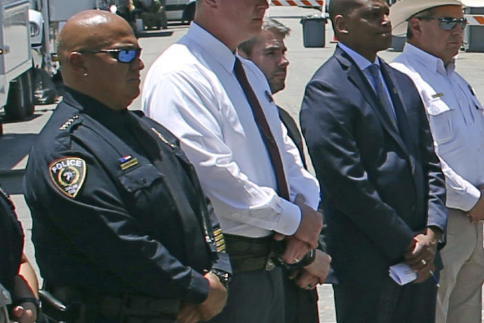 Uvalde School Police Chief Pete Arredondo (left) attends a news conference outside of the Robb Elementary School in Uvalde, Texas, on May 26.