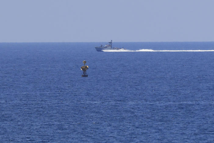 FILE - An Israeli Navy vessel patrols in the Mediterranean Sea, while Lebanon and Israel are being called to resume indirect talks over their disputed maritime border with U.S. mediation, off the southern town of Naqoura, Monday, June 6, 2022.
