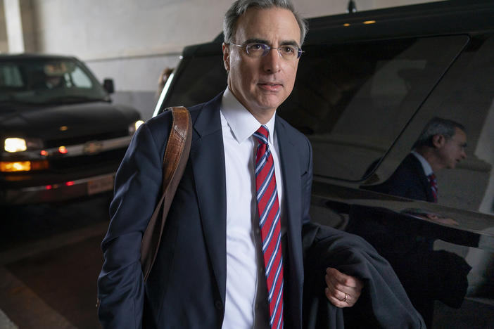 Former White House counsel Pat Cipollone departs the Capitol following defense arguments in the impeachment trial of President Donald Trump on charges of abuse of power and obstruction of Congress in 2020.