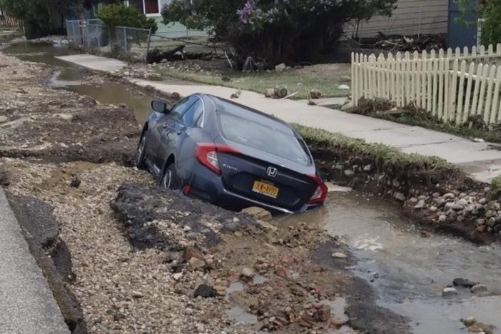 Kristin Groener's downstairs neighbor escaped his flooding apartment without his car keys, which meant he wasn't able to move his vehicle before the street sank.