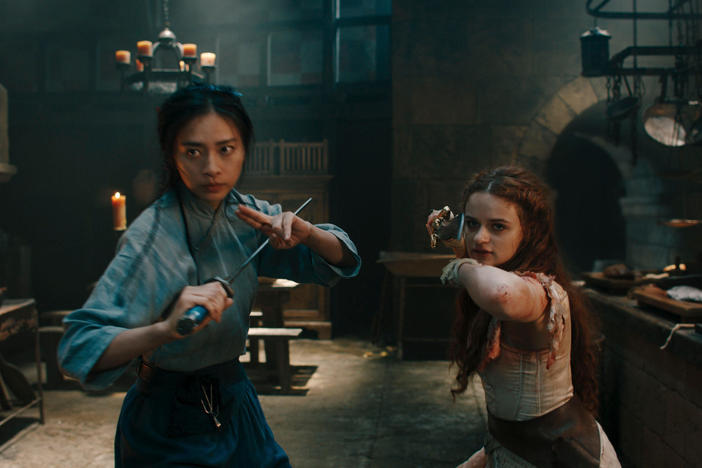Ngô Thanh Vân as Linh and Joey King as The Princess in the new Hulu film <em>The Princess</em>.
