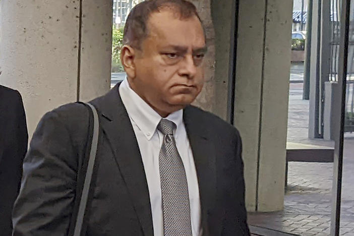 Ramesh "Sunny" Balwani walks into federal court in San Jose, Calif. on June 24, 2022.