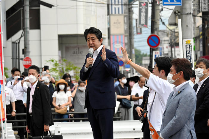 Former Japanese Prime Minister Shinzo Abe makes a speech before he was shot from behind by a man in Nara, a city in western Japan, on Friday.