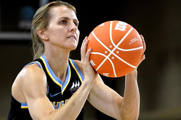 Allie Quigley competes in the 3-Point Contest at the WNBA All-Star basketball game in Chicago on Saturday. She won her fourth title — the most for any player in either the NBA or the WNBA.