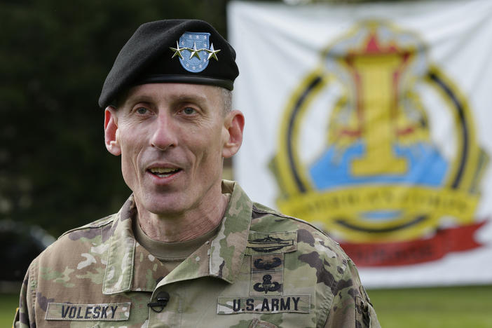 U.S. Army Lt. Gen. Gary Volesky talks to reporters following a change of command ceremony at Joint Base Lewis-McChord in Washington state on April 3, 2017. The Army has suspended Volesky over a recent tweet in response to the first lady.