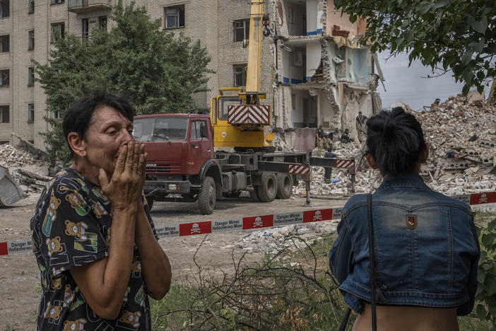 Iryna Shulimova, 59, weeps at the scene in the aftermath of a Russian rocket that hit an apartment building in Chasiv Yar, Donetsk region, eastern Ukraine, on Sunday. At least 24 people were killed and others may still be trapped in the rubble.