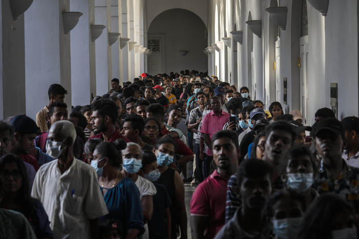 People throng President Gotabaya Rajapaksa's official residence on Tuesday, three days after it was stormed by anti government protesters in Colombo, Sri Lanka.