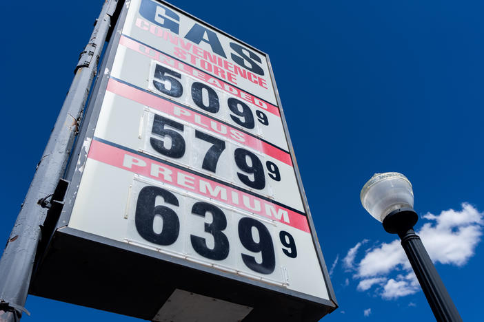 Gas prices are displayed on a sign at a gas station in Williams, Ariz., on Wednesday, July 6, 2022.