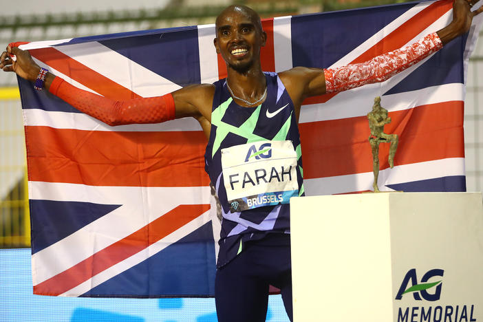 Mo Farah is one of the world's most successful track athletes, but he says he was first brought to the U.K. and forced to work as a child servant. He's seen here celebrating winning the One Hour Race at the Memorial Van Damme Brussels 2020 Diamond League meeting in Belgium.