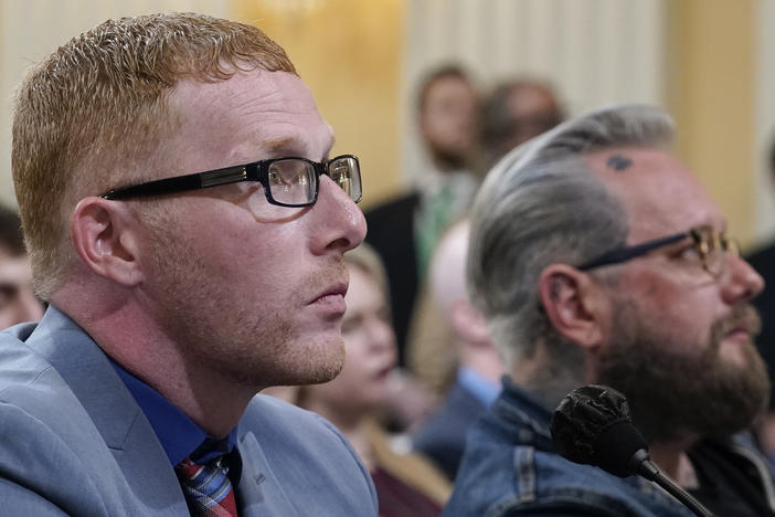 Stephen Ayres, who pleaded guilty in June 2022 to disorderly and disruptive conduct in a restricted building, left, and Jason Van Tatenhove, a former ally of Oath Keepers leader Stewart Rhodes, right, arrive to testify as the House select committee investigating the Jan. 6 attack on Tuesday.