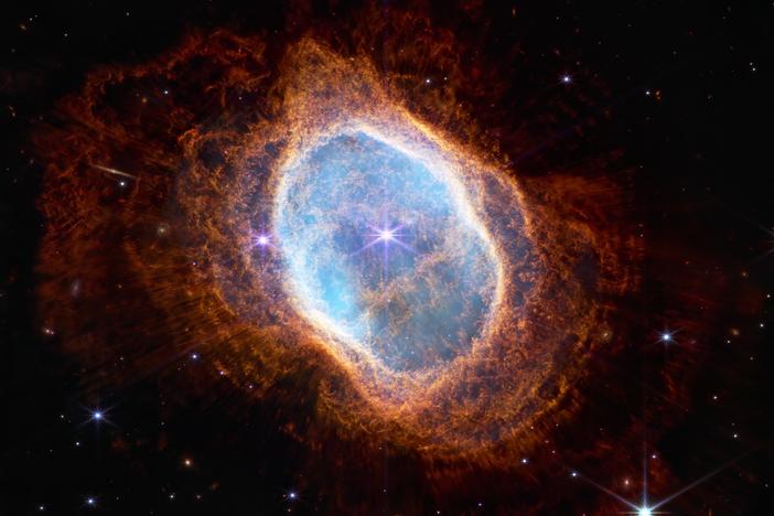 The bright star at the center of NGC 3132, Southern Nebula Ring, while prominent when viewed by NASA's Webb Telescope in near-infrared light, plays a supporting role in sculpting the surrounding nebula. A second star, barely visible at lower left along one of the bright star's diffraction spikes, is the nebula's source. It has ejected at least eight layers of gas and dust over thousands of years.