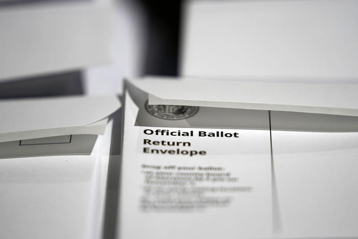 Stacks of ballot envelopes waiting to be mailed are seen at the Wake County Board of Elections on Sept. 3, 2020, in Raleigh, N.C. The Green Party has so far been kept off North Carolina's 2022 Senate ballot by the Democratic-led Board of Elections.