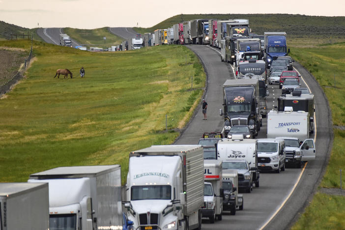 Traffic is backed up on Interstate 90 after a fatal pileup where at least 20 vehicles crashed near Hardin, Mont., on Friday.