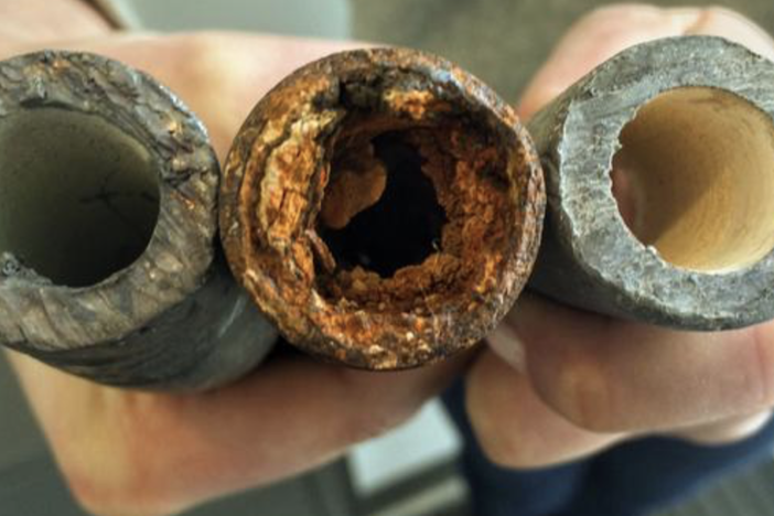 An image provided by the Environmental Protection Agency shows examples of a lead pipe, left, a corroded steel pipe, center, and a lead pipe treated with protective orthophosphate. The EPA is only now requiring water systems to take stock of their lead pipes, decades after new ones were banned.