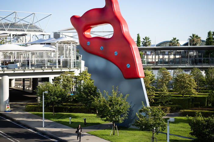 The large-scale street art "Saw, Sawing" by Claes Oldenburg / Coosje Van Bruggen Sculpture is seen last year in Tokyo.