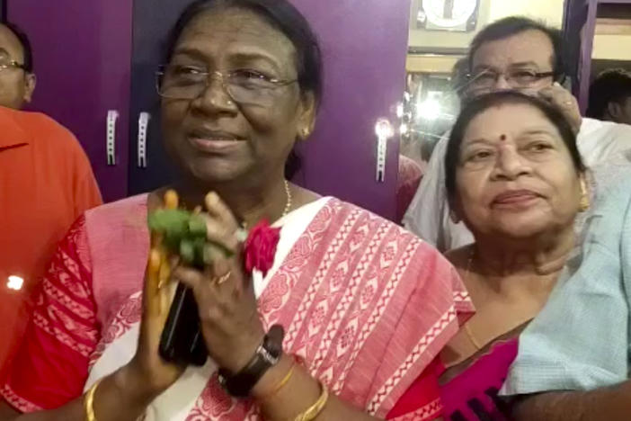 India's governing Bharatiya Janata Party's presidential candidate Draupadi Murmu, greets well wishers who called on her at Raigangpur in Odisha, India, Wednesday, June 22, 2022.