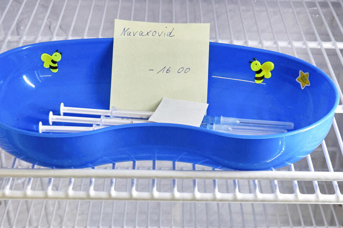 A kidney dish with syringes containing the Novavax COVID-19 vaccine sits in a refrigerator ready for use in February at a vaccination center in Prisdorf, Germany.
