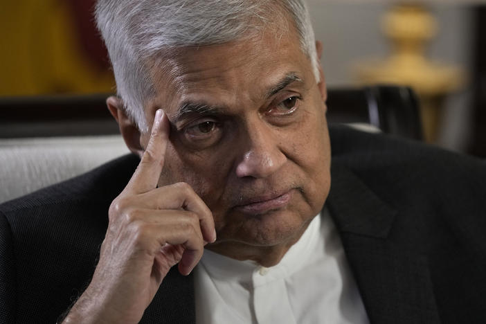 Sri Lanka's Prime Minister Ranil Wickremesinghe gestures during an interview with The Associated Press in Colombo, Sri Lanka, Saturday, June 11, 2022.