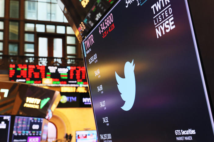 A Twitter logo is displayed on a screen at the New York Stock Exchange in early July.