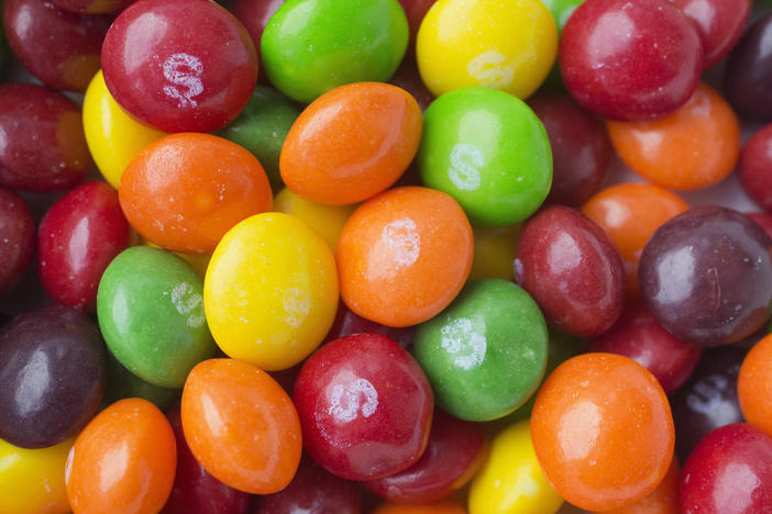 A recent lawsuit against Mars Inc., the company that makes Skittles, points titanium dioxide in the candy. The ingredient is one of thousands of additives allowed in foods under federal regulations.