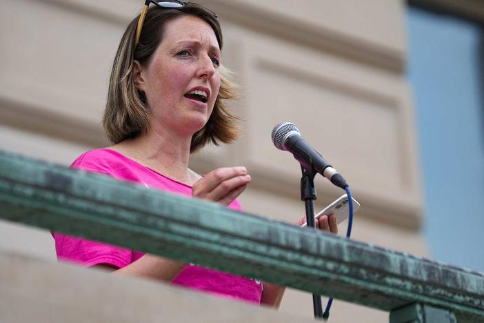 Dr. Caitlin Bernard, the Indiana doctor who provided an abortion to a 10-year-old rape victim from Ohio, speaks during an abortion rights rally in June at the Indiana Statehouse.